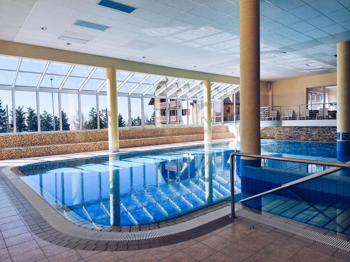 Pohorje Village Wellbeing Resort - Wellness & Spa Hotel Bolfenk Marburgo Esterno foto